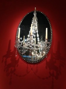 An Irish George II oval mirror chandelier at Ronald Phillips.