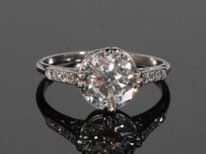 Antique diamond solitaire ring (9,000-10,000).