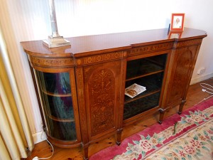 A Victorian marquetry decorated side cabinet (3,000-5,000).