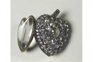 A 19th century heart shaped diamond locket with 63 stones (7,000-9,000).