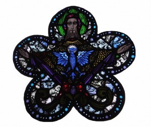 A cinquefoil stained glass panel by Richard King "God the Father and Holy Spirit" from the Harry Clarke Studios, formerly on display at All Hallows College in Dublin (2,000-3,000).