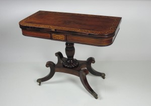 A Regency card table once at Fota House in Cork.