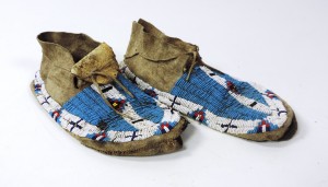 A pair of rare Plains beaded moccasins (1,000-1,500).