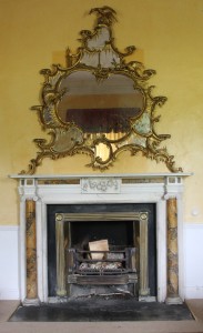 An 18th century carved gilt wood mirror originally at Carton (30,000-50,000).