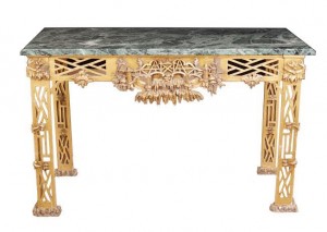 One of a pair of George III Chinese Chippendale carved gilt wood console tables (15,000-25,000)