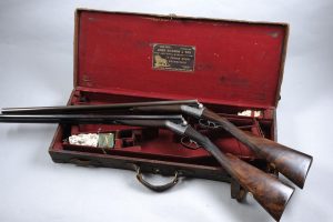 A pair of  12 bore round action ejector guns by Johh Dickson and Sons, 1902 (£10,000-15,000)