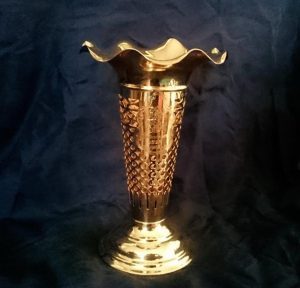 This rare rose vase in nine carat gold was made in Birmingham in 1906 by Walker Hall and Co. Ltd. Commissioned for a 50th wedding anniversary it will be at the Charles Vivian stand 
